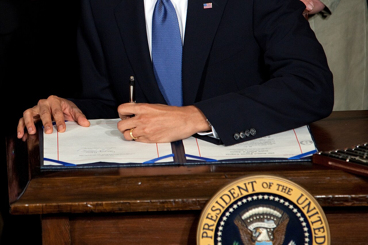 Obama signs the Affordable Care Act, March 23 2010